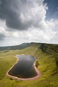 Llyn y Fan Fach, a glacial cirque, beneath Black Mountain in the Brecon Beacons National Llyn y Fan Fach, a glacial cirque, beneath Black Mountain in the Brecon Beacons National
