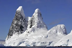 Mountains on the coast of Neumeyer channel, Antarctic Peninsula Mountains on the coast of Neumeyer channel, Antarctic Peninsula