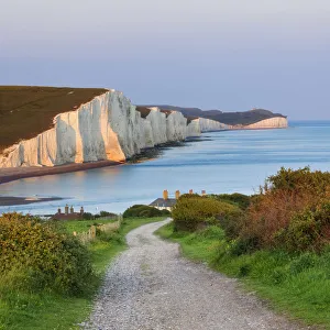 Path towards the coastguard cottages and the Seven Sisters Chalk Cliffs Path towards the coastguard cottages and the Seven Sisters Chalk Cliffs