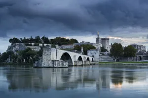 The Pont St-Benezet, Palais des Papes and Rhone River at dusk, Avignon, Provence The Pont St-Benezet, Palais des Papes and Rhone River at dusk, Avignon, Provence