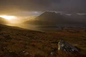 Rain clouds over Ben More Coigach and Loch Lurgainn at dawn, Coigach, Highland, Scotland Rain clouds over Ben More Coigach and Loch Lurgainn at dawn, Coigach, Highland, Scotland