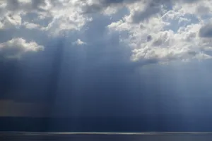 Ray of light shining through thunder clouds over Lake Ohrid, Galicica National Park Ray of light shining through thunder clouds over Lake Ohrid, Galicica National Park