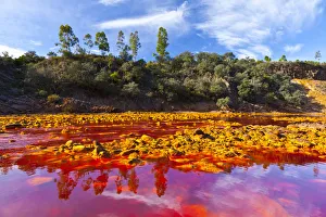 Red waters of the Rio Tinto, coloured by dissolved minerals, primarily iron. Andalusia Red waters of the Rio Tinto, coloured by dissolved minerals, primarily iron. Andalusia
