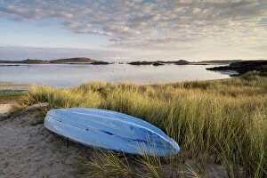 Prints for your Bathroom Collection: RF - Kayak and sand dunes bathed in early morning light, overlooking bay, Tresco, Isles of Scilly