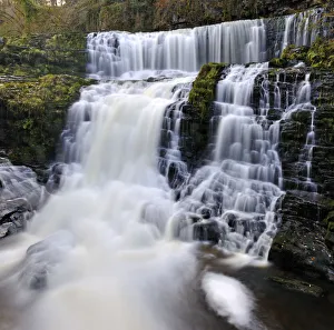 Sgwd Isaf Clun-gwyn waterfall. Ystradfellte, Brecon Beacons National Park, Wales, November 2011 Sgwd Isaf Clun-gwyn waterfall. Ystradfellte, Brecon Beacons National Park, Wales, November 2011
