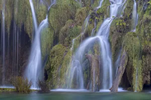 Water cascading over naturally formed tufa dam Water cascading over naturally formed tufa dam