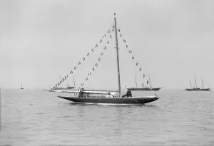 The 6 Metre Cremona moored with flags, 1913. Creator: Kirk & Sons of Cowes The 6 Metre Cremona moored with flags, 1913. Creator: Kirk & Sons of Cowes