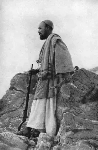 An Afridi lookout, Khyber and Kohat Pass, Pakistan and Afghanistan, 1922.Artist: Holmes & Co An Afridi lookout, Khyber and Kohat Pass, Pakistan and Afghanistan, 1922.Artist: Holmes & Co