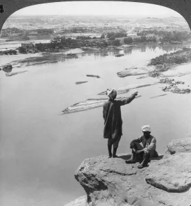 Aswan and the island of Elephantine as seen from the western cliffs, Egypt, 1905.Artist: Underwood & Underwood Aswan and the island of Elephantine as seen from the western cliffs, Egypt, 1905.Artist: Underwood & Underwood