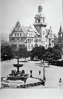 Black and white print of a building and park