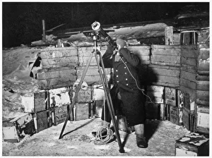 British Polar Exploration Prints: Commander Evans observing an Occulation of Jupiter, Antarctica, 1910-1912. Artist