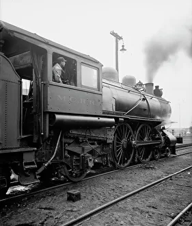 Black And White Train Images Prints: An Engineer at his post, c1904. Creator: Unknown