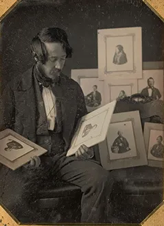 Images Dated 10th August 2020: Frederick Langenheim Looking at Talbotypes Print, 1849-51