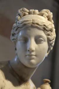 Prints of Head of Aphrodite. Detail from a Roman statue of bathing Aphrodite and Eros, after a Greek original of the second half of the 3rd century BC Arrows of Affection: A Timeless Journey Through Cupid's Realm: Aphrodite Head Print