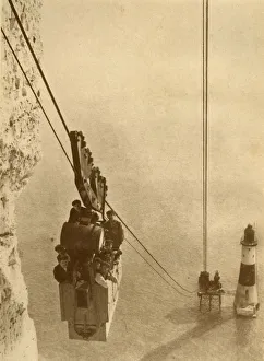 British Engineering Marvels Prints: The Lighthouse Builders, c1930. Creator: J. Weston & Son