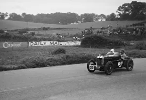 Prints of MG C-Type Midget 746S cc. Event Entry No: 30. Driver: Hamilton, H.C. DNS. Hamilton crashed in practice and a substitute car was driven by F.S. Barnes. Place: R.A.C. T.T. Race. Date: 20.8.32 Belfast Prints: MG C-Type Midget Print: RAC TT Race, Ards Circuit, 20.8.32
