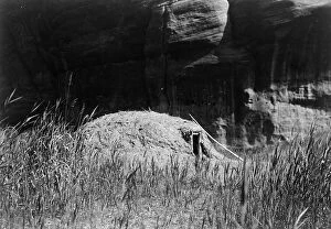 Rock Face Collection: Navaho hogan in Cañon del Muerta, c1906. Creator: Edward Sheriff Curtis