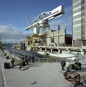 A nuclear submarine berthing at Devonport docks, Plymouth, Devon, 1980