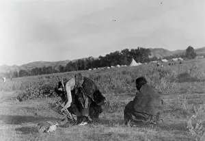 Native American Rituals Prints: Offering pipe to the skull-Cheyenne, c1910. Creator: Edward Sheriff Curtis