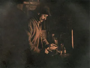 Early 20th Century Exploration History Prints: Ponting Developing a Plate in the Dark Room, c1910-1913, (1913)