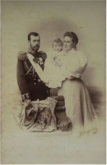 Alix Of Hesse Collection: Portrait of Nicholas II of Russia with Alexandra Fyodorovna and Daughter Olga, 1895