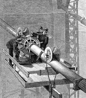 Putting wire wrapping around the suspension cables, Brooklyn Suspension Bridge, 1883 Putting wire wrapping around the suspension cables, Brooklyn Suspension Bridge, 1883