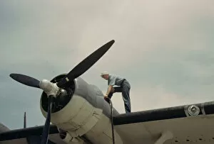 Airscrew Collection: Sailor mechanic fueling a plane at the Naval Air Base, Corpus Christi, Texas, 1942