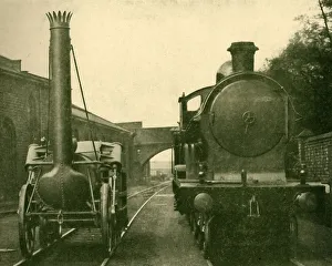 London Midland And Scottish Railway Prints: A full size model of Stephensons Rocket alongside an engine of the George