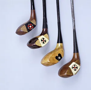 Spalding wooden clubs with coloured Fancy Face inserts, American, 1920s. Artist: Spalding Spalding wooden clubs with coloured Fancy Face inserts, American, 1920s. Artist: Spalding