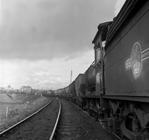 British Railways Collection: Steam loco no 65811 hauling coal from Lynemouth Colliery, Northumberland, 1963. Artist