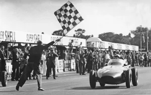 Stirling Moss winning 1957 British Grand Prix at Aintree in the Vanwall. Creator: Unknown Stirling Moss winning 1957 British Grand Prix at Aintree in the Vanwall. Creator: Unknown