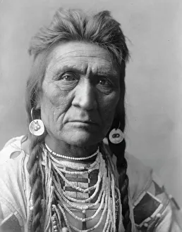 Wolf, c1908 Print: Head-and-shoulders portrait of Crow man