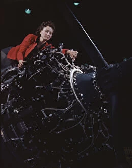 Alfred Palmer Collection: Woman at work on motor, Douglas Aircraft Company, Long Beach, Calif. 1942. Creator: Alfred T Palmer