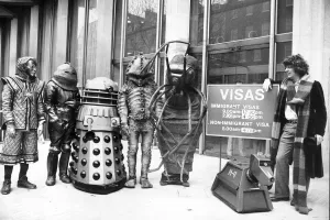 Actor Tom Baker as Dr Who, with his robot dog K-9, and assorted friends at the US Embassy 1978 Actor Tom Baker as Dr Who, with his robot dog K-9, and assorted friends at the US Embassy 1978