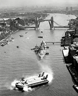 Hovercraft passing under Tower Bridge Hovercraft passing under Tower Bridge