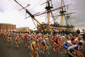 Tour de France cycle race passes through Portsmouth with HMS Victory in background Tour de France cycle race passes through Portsmouth with HMS Victory in background
