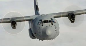 A Hercules Transporter Aircraft of 30 Squadron is shown in flight A Hercules Transporter Aircraft of 30 Squadron is shown in flight