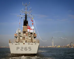 HMS Dumbarton Castle displays her Paying Off Pennant as she enters Portsmouth Harbour HMS Dumbarton Castle displays her Paying Off Pennant as she enters Portsmouth Harbour
