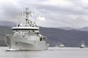 Led by HMS Enterprise an Echo Class Survey Vessel, ships from various nations can Led by HMS Enterprise an Echo Class Survey Vessel, ships from various nations can