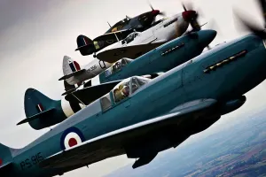 Spitfire Prints: Print of Spitfires and Hurricanes in Formation Over Lincolnshire Landscape