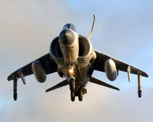 A Sea Harrier FA2 of 801 Squadron is seen hovering above the deck of HMS Illustrious A Sea Harrier FA2 of 801 Squadron is seen hovering above the deck of HMS Illustrious