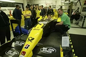 Images Dated 28th October 2002: Club Jordan Factory Open Day: Fans get the chance to sit in a Jordan EJ12