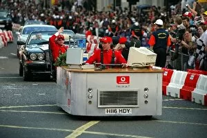 Images Dated 6th July 2004: F1 Regent Street Parade: Vodafone mobile desk