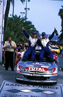 Images Dated 24th September 2002: Fia World Rally Championship: Sanremo Rally winners Gilles Panizzi, right, and Herve Panizzi