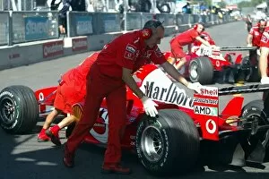 Images Dated 13th September 2003: Formula One World Championship: The two Ferraris of Michael Schumacher Ferrari F2003-GA