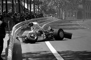 Accident Collection: Formula One World Championship: Graham Hill climbs from the wreckage of his Lotus 49B