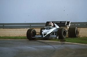 Images Dated 14th February 2001: Formula One World Championship: Nelson Piquet digs himself out of the gravel