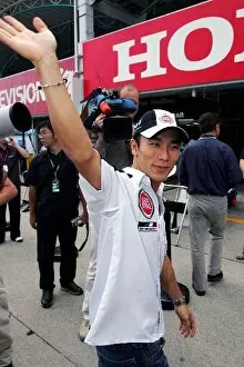 Images Dated 7th October 2004: Formula One World Championship: Takuma Sato BAR waves to his fans