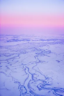 Aerial View Of The Kobuk River And Waring Mountains Just Before Sunrise During Winter Near Noatak, Arctic Alaska Aerial View Of The Kobuk River And Waring Mountains Just Before Sunrise During Winter Near Noatak, Arctic Alaska