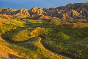 The area called yellow mounds lit by the sunset in badlands national park; south dakota united states of america The area called yellow mounds lit by the sunset in badlands national park; south dakota united states of america